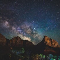 Milky Way, night sky over canyon